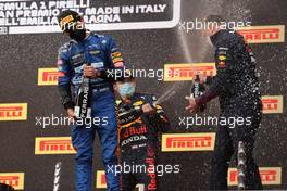 Lando Norris (GBR) McLaren MCL35M wth Max Verstappen (NLD) Red Bull Racing RB16B and Karl Sengstbratl, Red Bull Racing Finance & Operations Director. 18.04.2021. Formula 1 World Championship, Rd 2, Emilia Romagna Grand Prix, Imola, Italy, Race Day.
