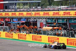 Lando Norris (GBR) McLaren MCL35M celebrates his third position as he passes his team at the end of the race. 18.04.2021. Formula 1 World Championship, Rd 2, Emilia Romagna Grand Prix, Imola, Italy, Race Day.