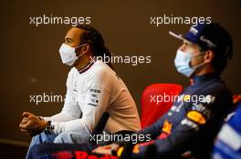 (L to R): Lewis Hamilton (GBR) Mercedes AMG F1 and Max Verstappen (NLD) Red Bull Racing in the post race FIA Press Conference. 18.04.2021. Formula 1 World Championship, Rd 2, Emilia Romagna Grand Prix, Imola, Italy, Race Day.