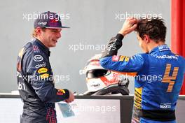 (L to R): Race winner Max Verstappen (NLD) Red Bull Racing and third placed Lando Norris (GBR) McLaren in parc ferme. 18.04.2021. Formula 1 World Championship, Rd 2, Emilia Romagna Grand Prix, Imola, Italy, Race Day.