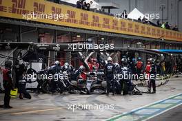 Yuki Tsunoda (JPN) AlphaTauri AT02 makes a pit stop. 18.04.2021. Formula 1 World Championship, Rd 2, Emilia Romagna Grand Prix, Imola, Italy, Race Day.
