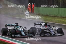 (L to R): Lance Stroll (CDN) Aston Martin F1 Team AMR21 and Pierre Gasly (FRA) AlphaTauri AT02 battle for position. 18.04.2021. Formula 1 World Championship, Rd 2, Emilia Romagna Grand Prix, Imola, Italy, Race Day.