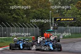 (L to R): Esteban Ocon (FRA) Alpine F1 Team A521 and Fernando Alonso (ESP) Alpine F1 Team A521 battle for position. 18.04.2021. Formula 1 World Championship, Rd 2, Emilia Romagna Grand Prix, Imola, Italy, Race Day.