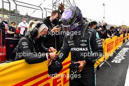 Lewis Hamilton (GBR) Mercedes AMG F1 celebrates his pole position with Angela Cullen (NZL) Mercedes AMG F1 Physiotherapist in qualifying parc ferme. 17.04.2021. Formula 1 World Championship, Rd 2, Emilia Romagna Grand Prix, Imola, Italy, Qualifying Day.