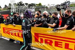 Lewis Hamilton (GBR) Mercedes AMG F1 celebrates his pole position with the team in qualifying parc ferme. 17.04.2021. Formula 1 World Championship, Rd 2, Emilia Romagna Grand Prix, Imola, Italy, Qualifying Day.