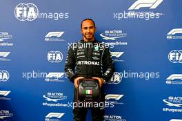 Lewis Hamilton (GBR) Mercedes AMG F1 celebrates with the Pirelli Pole Position Award in qualifying parc ferme. 17.04.2021. Formula 1 World Championship, Rd 2, Emilia Romagna Grand Prix, Imola, Italy, Qualifying Day.