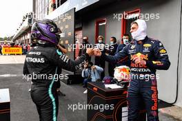 (L to R): Lewis Hamilton (GBR) Mercedes AMG F1 celebrates his pole position with third placed Max Verstappen (NLD) Red Bull Racing in qualifying parc ferme. 17.04.2021. Formula 1 World Championship, Rd 2, Emilia Romagna Grand Prix, Imola, Italy, Qualifying Day.