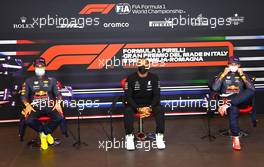 (L to R): Sergio Perez (MEX) Red Bull Racing; Lewis Hamilton (GBR) Mercedes AMG F1; and Max Verstappen (NLD) Red Bull Racing, in the post qualifying FIA Press Conference. 17.04.2021. Formula 1 World Championship, Rd 2, Emilia Romagna Grand Prix, Imola, Italy, Qualifying Day.