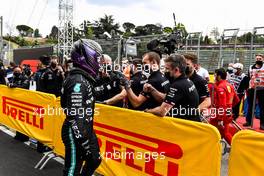 Lewis Hamilton (GBR) Mercedes AMG F1 celebrates his pole position with the team in qualifying parc ferme. 17.04.2021. Formula 1 World Championship, Rd 2, Emilia Romagna Grand Prix, Imola, Italy, Qualifying Day.