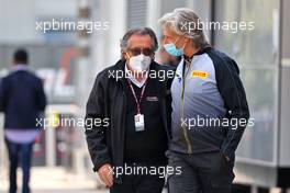 (L to R): Giancarlo Minardi (ITA) with Roberto Boccafogli (ITA) Pirelli Head of F1 Communications. 18.04.2021. Formula 1 World Championship, Rd 2, Emilia Romagna Grand Prix, Imola, Italy, Race Day.