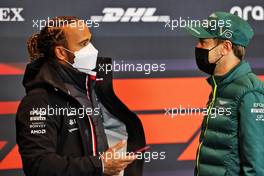(L to R): Lewis Hamilton (GBR) Mercedes AMG F1 with Sebastian Vettel (GER) Aston Martin F1 Team in the FIA Press Conference. 15.04.2021. Formula 1 World Championship, Rd 2, Emilia Romagna Grand Prix, Imola, Italy, Preparation Day.