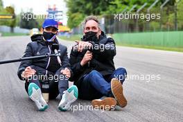 Esteban Ocon (FRA) Alpine F1 Team on the circuit with Frank Montangy (FRA) Canal+ TV Presenter. 15.04.2021. Formula 1 World Championship, Rd 2, Emilia Romagna Grand Prix, Imola, Italy, Preparation Day.
