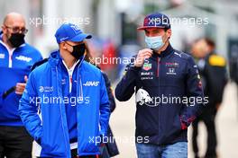 (L to R): Mick Schumacher (GER) Haas F1 Team with Max Verstappen (NLD) Red Bull Racing. 15.04.2021. Formula 1 World Championship, Rd 2, Emilia Romagna Grand Prix, Imola, Italy, Preparation Day.