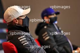 Esteban Ocon (FRA) Alpine F1 Team and Valtteri Bottas (FIN) Mercedes AMG F1 in the FIA Press Conference. 15.04.2021. Formula 1 World Championship, Rd 2, Emilia Romagna Grand Prix, Imola, Italy, Preparation Day.