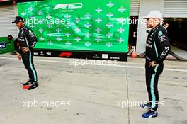 (L to R): Lewis Hamilton (GBR) Mercedes AMG F1 and Valtteri Bottas (FIN) Mercedes AMG F1 in qualifying parc ferme. 10.09.2021. Formula 1 World Championship, Rd 14, Italian Grand Prix, Monza, Italy, Qualifying Day.