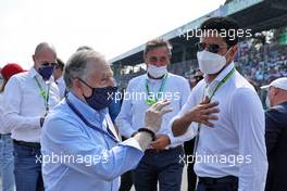 Jean Todt (FRA) FIA President with Nasser Al-Khelaifi (QAT) President of Paris Saint-Germain on the grid. 12.09.2021. Formula 1 World Championship, Rd 14, Italian Grand Prix, Monza, Italy, Race Day.