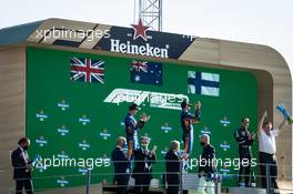 The podium (L to R): Lando Norris (GBR) McLaren, second; Daniel Ricciardo (AUS) McLaren, race winner; Valtteri Bottas (FIN) Mercedes AMG F1, third; Zak Brown (USA) McLaren Executive Director. 12.09.2021. Formula 1 World Championship, Rd 14, Italian Grand Prix, Monza, Italy, Race Day.