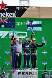The podium (L to R): Lando Norris (GBR) McLaren MCL35M, second; Zak Brown (USA) McLaren Executive Director; Daniel Ricciardo (AUS) McLaren, race winner; Valtteri Bottas (FIN) Mercedes AMG F1, third. 12.09.2021. Formula 1 World Championship, Rd 14, Italian Grand Prix, Monza, Italy, Race Day.