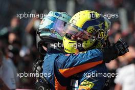Daniel Ricciardo (AUS) McLaren MCL35M and Lando Norris (GBR) McLaren MCL35M. 12.09.2021. Formula 1 World Championship, Rd 14, Italian Grand Prix, Monza, Italy, Race Day.