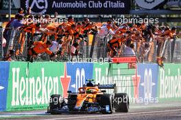 Lando Norris (GBR) McLaren MCL35M celebrates his second position as he passes the team at the end of the race. 12.09.2021. Formula 1 World Championship, Rd 14, Italian Grand Prix, Monza, Italy, Race Day.