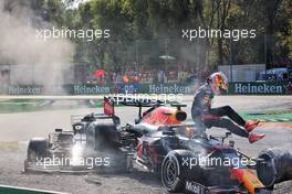Max Verstappen (NLD) Red Bull Racing RB16B and Lewis Hamilton (GBR) Mercedes AMG F1 W12 crashed at the first chicane. 12.09.2021. Formula 1 World Championship, Rd 14, Italian Grand Prix, Monza, Italy, Race Day.