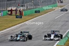(L to R): Sebastian Vettel (GER) Aston Martin F1 Team AMR21 and George Russell (GBR) Williams Racing FW43B battle for position. 12.09.2021. Formula 1 World Championship, Rd 14, Italian Grand Prix, Monza, Italy, Race Day.