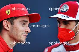 (L to R): Charles Leclerc (MON) Ferrari and Antonio Giovinazzi (ITA) Alfa Romeo Racing. 11.09.2021. Formula 1 World Championship, Rd 14, Italian Grand Prix, Monza, Italy, Sprint Day.