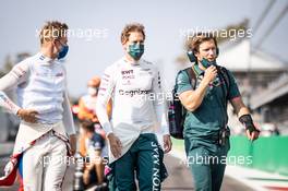 (L to R): Mick Schumacher (GER) Haas F1 Team with Sebastian Vettel (GER) Aston Martin F1 Team. 11.09.2021. Formula 1 World Championship, Rd 14, Italian Grand Prix, Monza, Italy, Sprint Day.