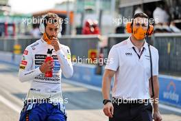 Daniel Ricciardo (AUS) McLaren with Michael Italiano (AUS) McLaren Performance Coach. 11.09.2021. Formula 1 World Championship, Rd 14, Italian Grand Prix, Monza, Italy, Sprint Day.