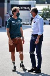 (L to R): Sebastian Vettel (GER) Aston Martin F1 Team with Stefano Domenicali (ITA) Formula One President and CEO. 12.09.2021. Formula 1 World Championship, Rd 14, Italian Grand Prix, Monza, Italy, Race Day.