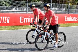 (L to R): Max Verstappen (NLD) Red Bull Racing rides the circuit with team mate Sergio Perez (MEX) Red Bull Racing. 09.09.2021. Formula 1 World Championship, Rd 14, Italian Grand Prix, Monza, Italy, Preparation Day.