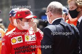 (L to R): Charles Leclerc (MON) Ferrari with HSH Prince Albert of Monaco (MON) on the grid. 23.05.2021. Formula 1 World Championship, Rd 5, Monaco Grand Prix, Monte Carlo, Monaco, Race Day.