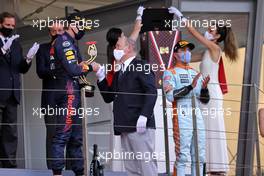 Race winner Max Verstappen (NLD) Red Bull Racing on the podium with HSH Prince Albert of Monaco (MON). 23.05.2021. Formula 1 World Championship, Rd 5, Monaco Grand Prix, Monte Carlo, Monaco, Race Day.