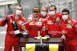 Carlos Sainz Jr (ESP) Ferrari SF-21 celebrates his third position in parc ferme with the team. 23.05.2021. Formula 1 World Championship, Rd 5, Monaco Grand Prix, Monte Carlo, Monaco, Race Day.
