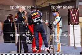 (L to R): Adrian Newey (GBR) Red Bull Racing Chief Technical Officer celebrates on the podium with race winner Max Verstappen (NLD) Red Bull Racing and Lando Norris (GBR) McLaren. 23.05.2021. Formula 1 World Championship, Rd 5, Monaco Grand Prix, Monte Carlo, Monaco, Race Day.