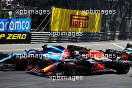 Esteban Ocon (FRA) Alpine F1 Team A521 and Sergio Perez (MEX) Red Bull Racing RB16B at the start of the race. 23.05.2021. Formula 1 World Championship, Rd 5, Monaco Grand Prix, Monte Carlo, Monaco, Race Day.