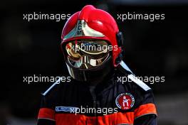 Esteban Ocon (FRA) Alpine F1 Team A521 reflected in a fire marshal's helmet. 23.05.2021. Formula 1 World Championship, Rd 5, Monaco Grand Prix, Monte Carlo, Monaco, Race Day.