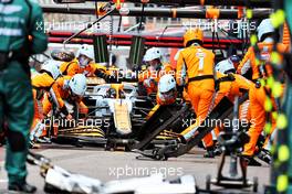 Lando Norris (GBR) McLaren MCL35M makes a pit stop. 23.05.2021. Formula 1 World Championship, Rd 5, Monaco Grand Prix, Monte Carlo, Monaco, Race Day.