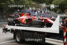 The damaged Ferrari SF-21 of Charles Leclerc (MON) Ferrari SF-21 is recovered back to the pits on the back of a truck. 22.05.2021. Formula 1 World Championship, Rd 5, Monaco Grand Prix, Monte Carlo, Monaco, Qualifying Day.