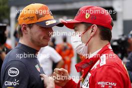 Charles Leclerc (MON) Ferrari (Right) celebrates his pole position in qualifying parc ferme with second placed Max Verstappen (NLD) Red Bull Racing. 22.05.2021. Formula 1 World Championship, Rd 5, Monaco Grand Prix, Monte Carlo, Monaco, Qualifying Day.