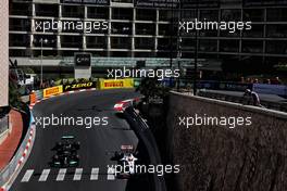 Nikita Mazepin (RUS) Haas F1 Team VF-21 and Lewis Hamilton (GBR) Mercedes AMG F1 W12. 20.05.2021. Formula 1 World Championship, Rd 5, Monaco Grand Prix, Monte Carlo, Monaco, Practice Day.