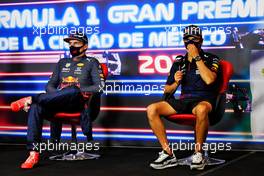 (L to R): Sergio Perez (MEX) Red Bull Racing and Max Verstappen (NLD) Red Bull Racing in the post race FIA Press Conference. 07.11.2021. Formula 1 World Championship, Rd 18, Mexican Grand Prix, Mexico City, Mexico, Race Day.