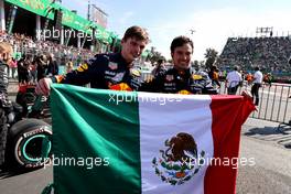 Max Verstappen (NLD) Red Bull Racing RB16B and Sergio Perez (MEX) Red Bull Racing RB16B. 07.11.2021. Formula 1 World Championship, Rd 18, Mexican Grand Prix, Mexico City, Mexico, Race Day.