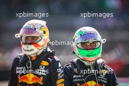 Third placed Sergio Perez (MEX) Red Bull Racing with race winning team mate Max Verstappen (NLD) Red Bull Racing in parc ferme. 07.11.2021. Formula 1 World Championship, Rd 18, Mexican Grand Prix, Mexico City, Mexico, Race Day.