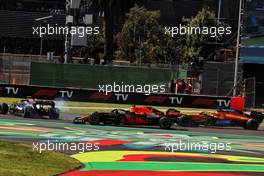 Valtteri Bottas (FIN) Mercedes AMG F1 W12 spins in front of Sergio Perez (MEX) Red Bull Racing RB16B and Daniel Ricciardo (AUS) McLaren MCL35M at the start of the race. 07.11.2021. Formula 1 World Championship, Rd 18, Mexican Grand Prix, Mexico City, Mexico, Race Day.