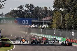 (L to R): Daniel Ricciardo (AUS) McLaren MCL35M; Lewis Hamilton (GBR) Mercedes AMG F1 W12; Valtteri Bottas (FIN) Mercedes AMG F1 W12; and Max Verstappen (NLD) Red Bull Racing RB16B at the start of the race. 07.11.2021. Formula 1 World Championship, Rd 18, Mexican Grand Prix, Mexico City, Mexico, Race Day.