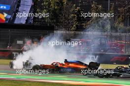 Valtteri Bottas (FIN) Mercedes AMG F1 W12 spins after being hit by Daniel Ricciardo (AUS) McLaren MCL35M at the start of the race. 07.11.2021. Formula 1 World Championship, Rd 18, Mexican Grand Prix, Mexico City, Mexico, Race Day.