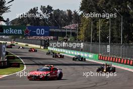 Max Verstappen (NLD) Red Bull Racing RB16B leads behind the leads behind the Mercedes FIA Safety Car. 07.11.2021. Formula 1 World Championship, Rd 18, Mexican Grand Prix, Mexico City, Mexico, Race Day.