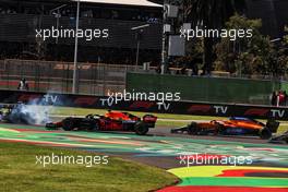 Valtteri Bottas (FIN) Mercedes AMG F1 W12 spins in front of Sergio Perez (MEX) Red Bull Racing RB16B and Daniel Ricciardo (AUS) McLaren MCL35M at the start of the race. 07.11.2021. Formula 1 World Championship, Rd 18, Mexican Grand Prix, Mexico City, Mexico, Race Day.