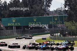 Max Verstappen (NLD) Red Bull Racing RB16B leads the field at the start of the race. 07.11.2021. Formula 1 World Championship, Rd 18, Mexican Grand Prix, Mexico City, Mexico, Race Day.